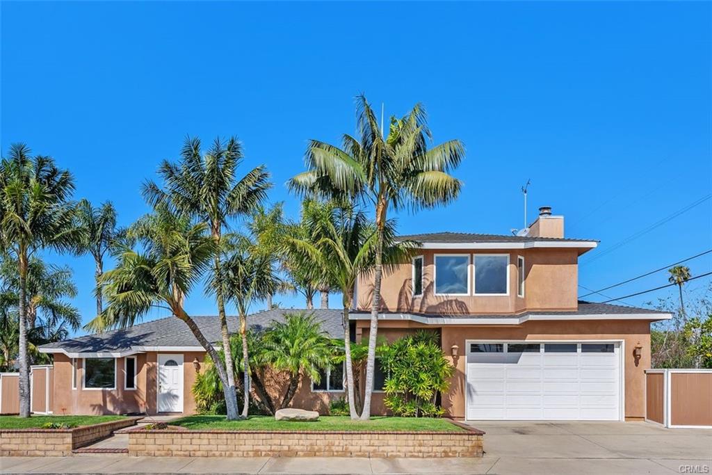 2199 National Ave — front elevation of the expanded two-story Costa Mesa home