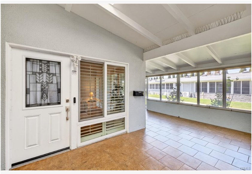 1200 Canoe Brook Dr #19D — fully tiled private patio with dual pane windows and privacy shades