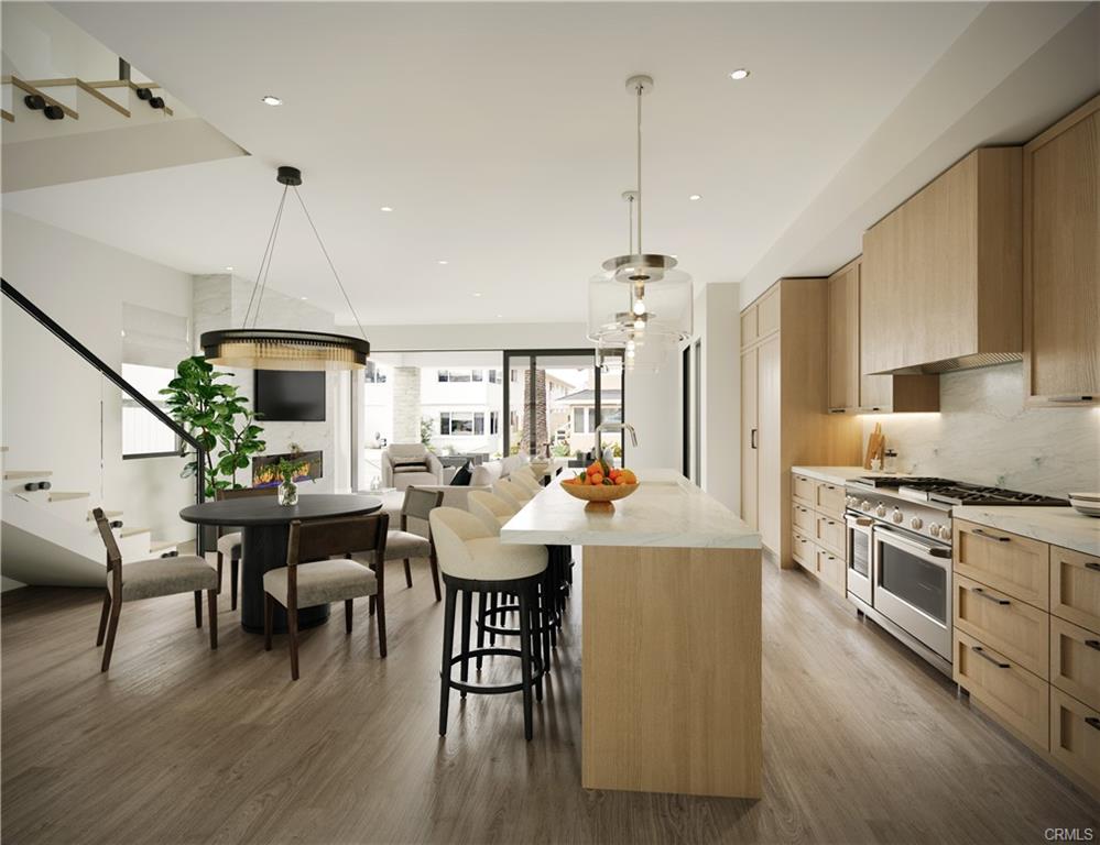 306 Marguerite Ave — rendered kitchen and dining with island seating