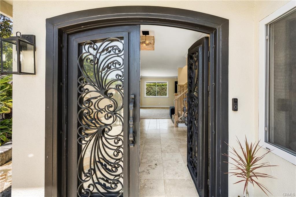 2342 Cynthia Ct — custom wrought iron and glass entry door