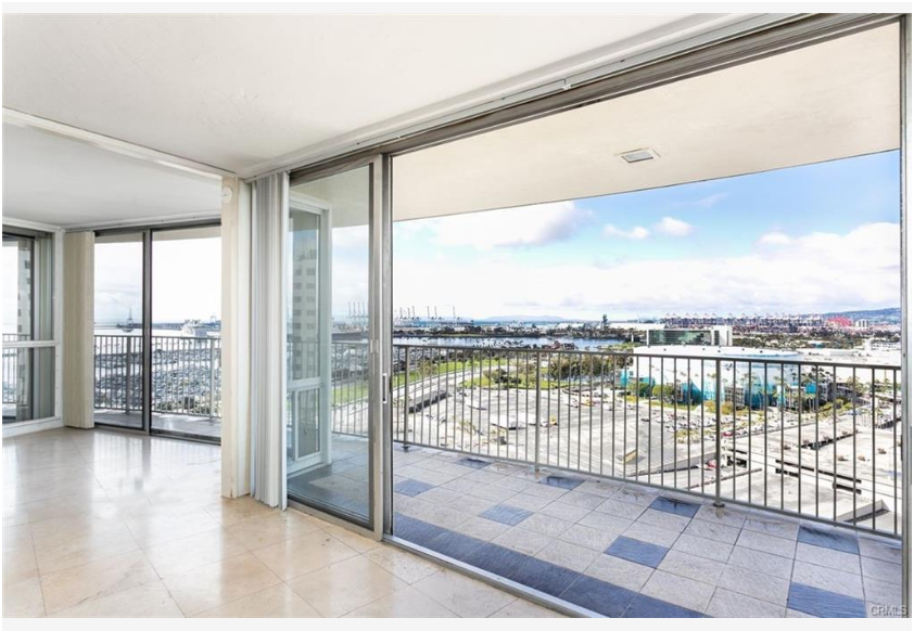 700 E Ocean Blvd #2308 — sliding glass doors opening to the large private balcony