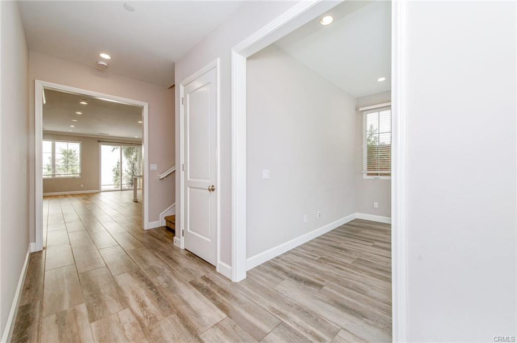 115 Mustang — entry hall with wide-plank flooring