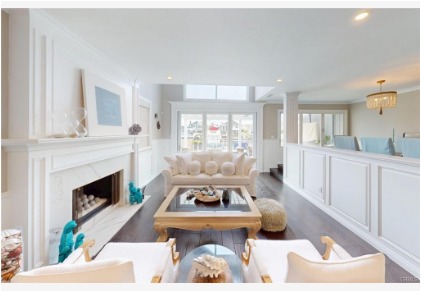 16143 Saint Croix — living room with fireplace, custom millwork, and harbor-view windows