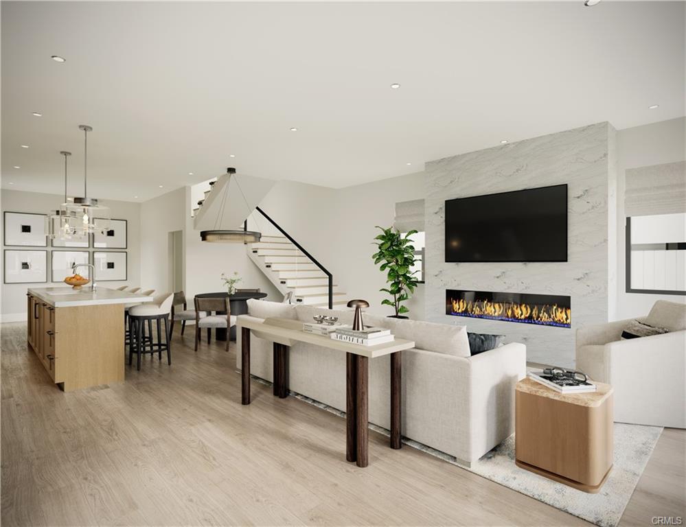 306 Marguerite Ave — rendered great room with fireplace and open stair