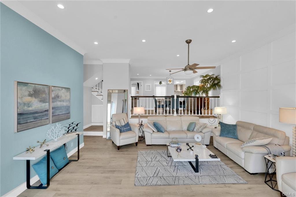 16276 Pacific Cir #B — dining area with pendant lighting open to the entry