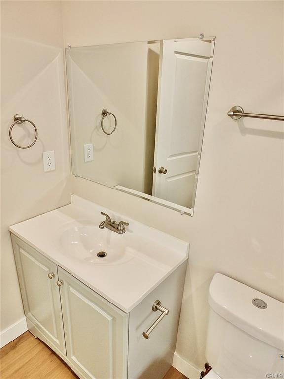 1335 W Burnett St — remodeled bathroom with new vanity and mirror