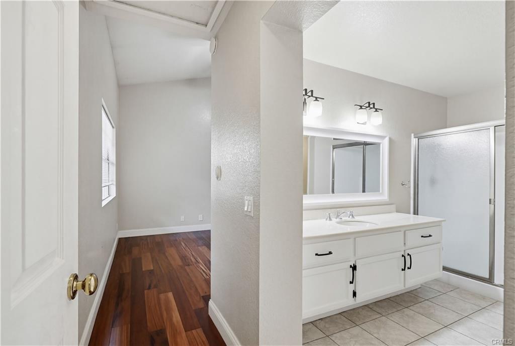 3650 S Bear St #77 — secondary full bath with walk-in shower