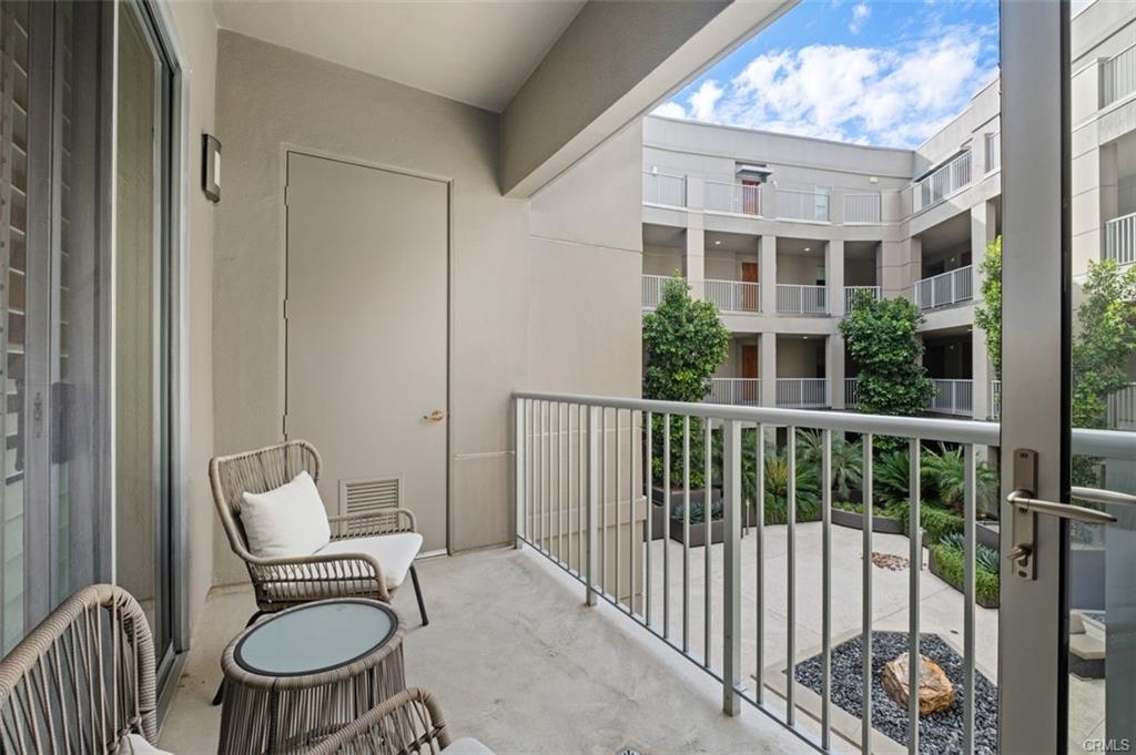 21 Gramercy #202 — private balcony overlooking the interior courtyard