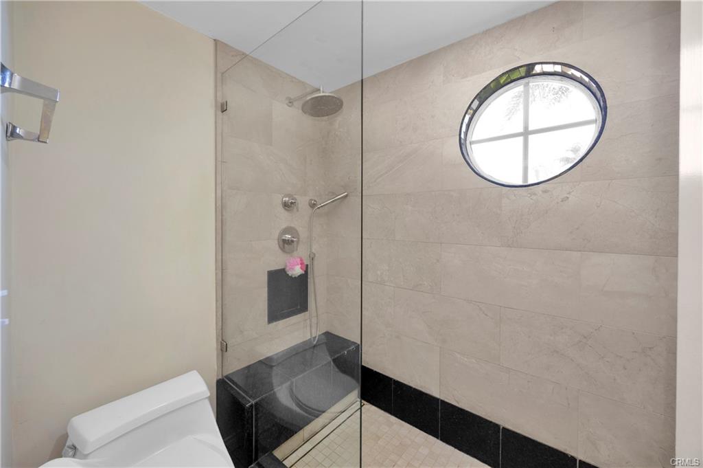 9112 Playa Dr — remodeled primary bath with walk-in shower