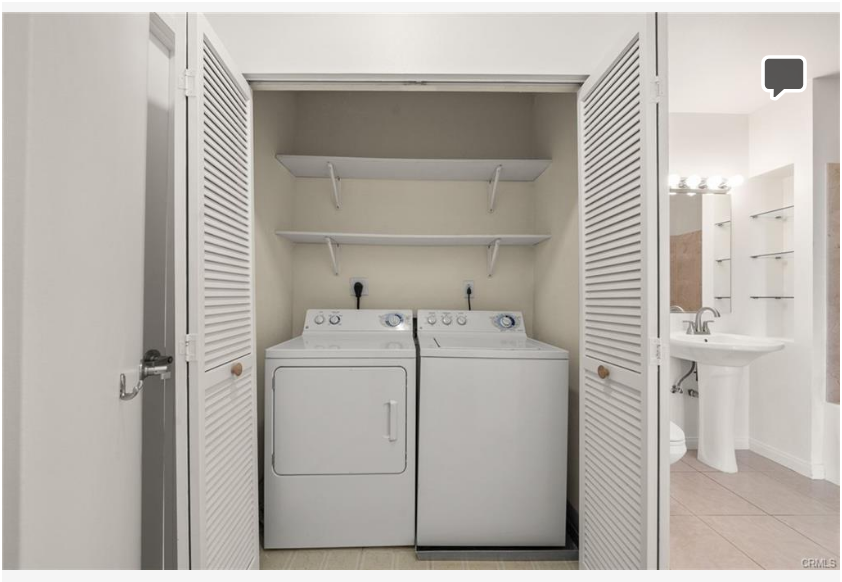 488 E Ocean Blvd #717 — full-sized interior laundry area