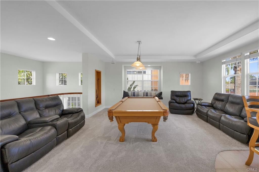 9112 Playa Dr — upstairs family room with billiards and wet bar