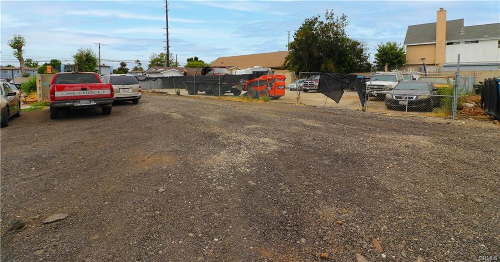 803 S Sullivan St — open graded yard area with room for parking or expansion