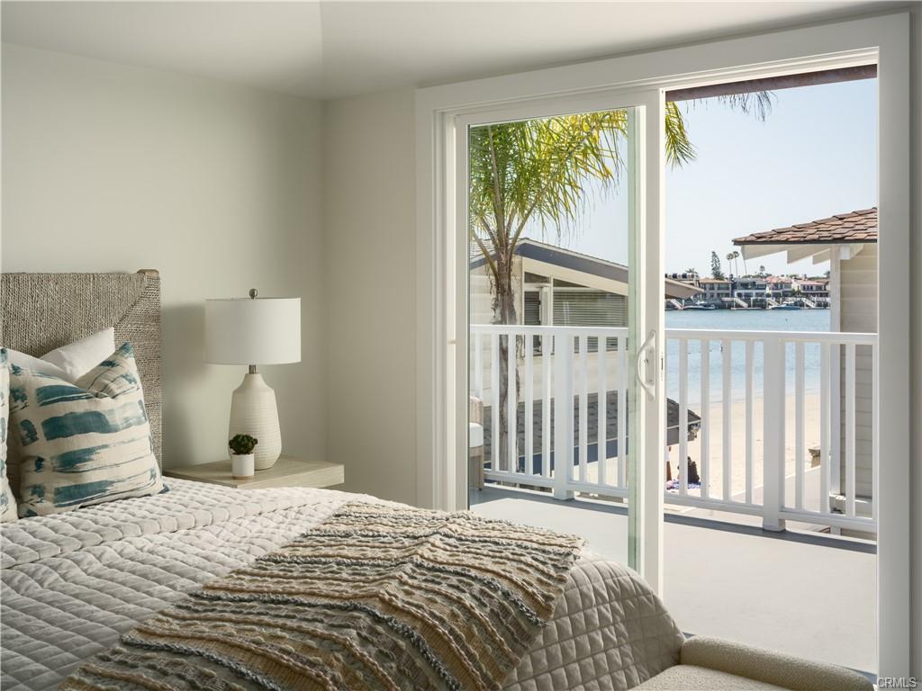 2715 Cove Street — bedroom opening to the deck