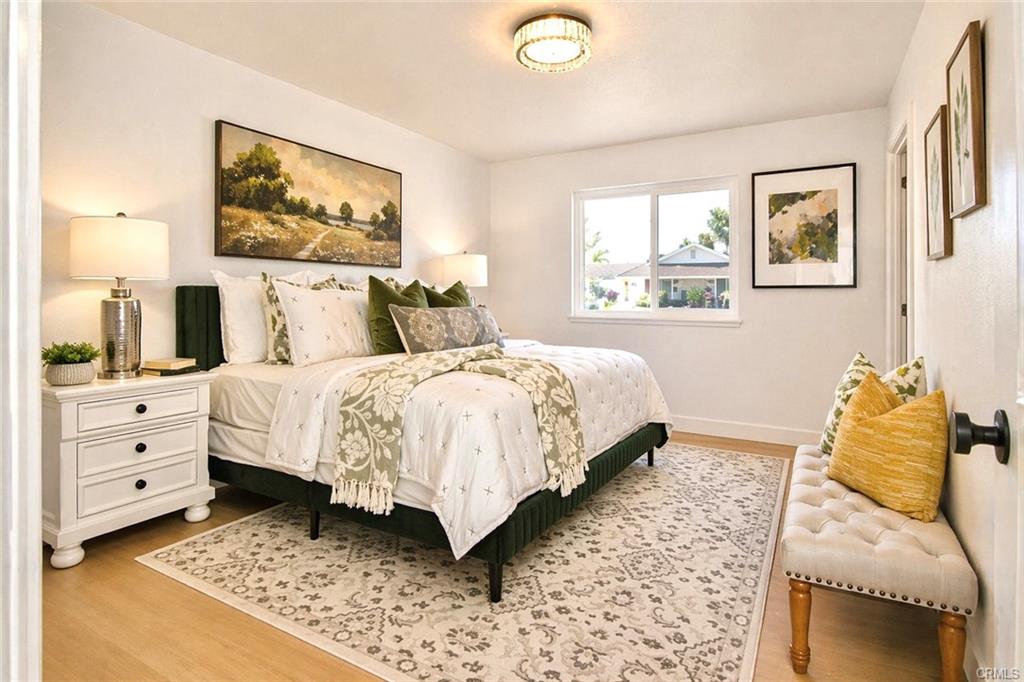 9142 Parliament Ave — second bedroom with neutral finishes and natural light