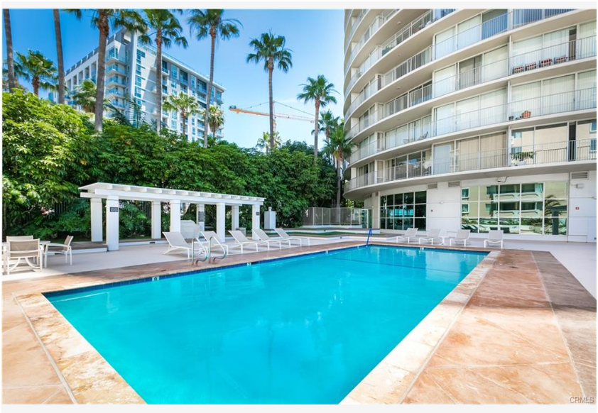 700 E Ocean Blvd #2308 — International Tower resident pool deck with lounge seating