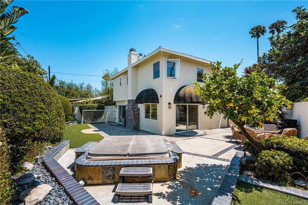 2342 Cynthia Ct — private backyard retreat with spa, turf, and mature lemon tree