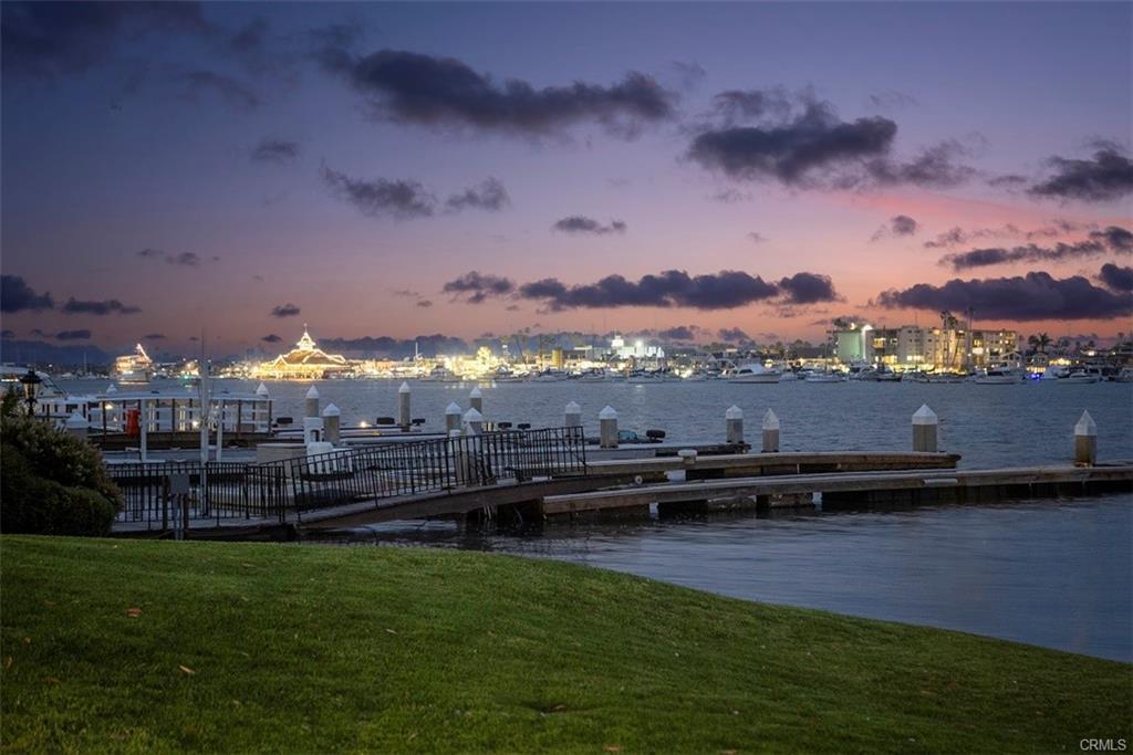 20 Harbor Island — harbor and city lights from the seawall at twilight