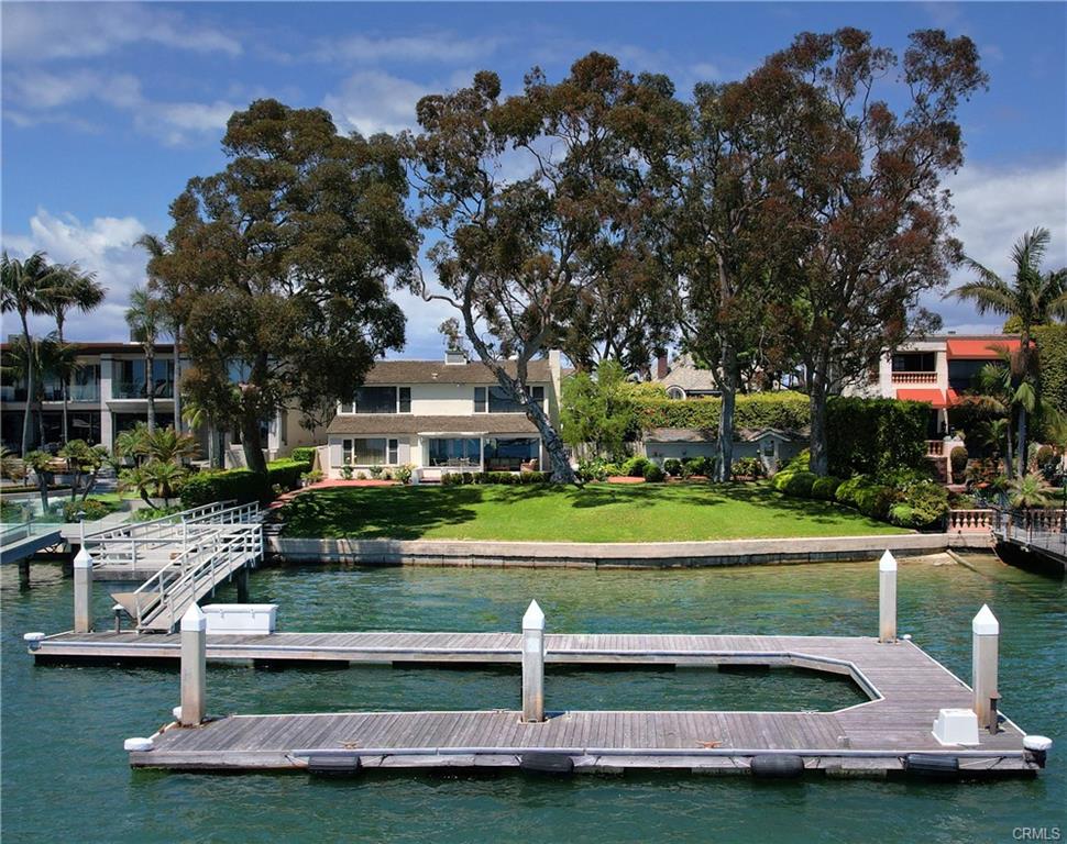 Private dock and bayfront lawn on Harbor Island