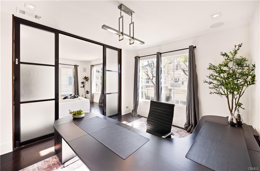 4 Chandon — main-level office behind custom sliding glass doors