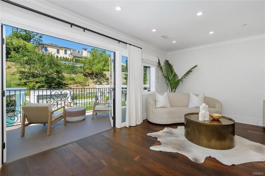 4 Inverness Lane — primary suite with fireplace and private deck