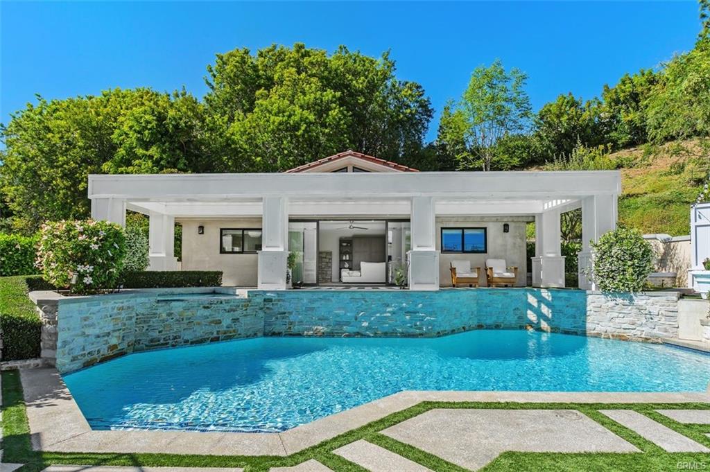 Resort-style pool and lawn at 4 Inverness Lane